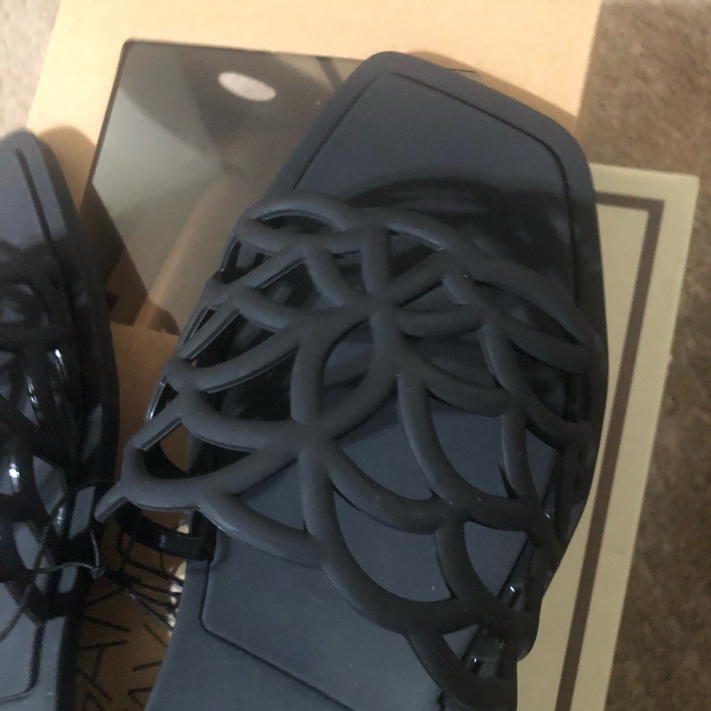 bebe Black Laser-Cut Slide Sandals